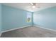 Light and airy bedroom with a window for natural light at 1423 Bunker Dr, Davenport, FL 33896