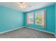 Light and airy bedroom with ceiling fan, and two windows for natural light at 1423 Bunker Dr, Davenport, FL 33896