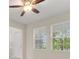Living room featuring tiled floors and views of the outdoors at 1423 Bunker Dr, Davenport, FL 33896