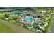 A community recreational center with a pool, mini-golf, a beach volleyball court, and shaded cabanas at 1423 Bunker Dr, Davenport, FL 33896