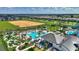 Community park, waterpark, pool and mini golf are set amidst lush landscaping and residential homes at 1423 Bunker Dr, Davenport, FL 33896