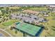 Enjoy the outdoor tennis and putting green at this community's recreation area surrounded by lush landscaping at 1423 Bunker Dr, Davenport, FL 33896