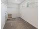 Walk-in closet featuring custom storage shelves and a cabinet at 1423 Bunker Dr, Davenport, FL 33896