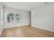 Bright bedroom featuring sleek hardwood floors and bright windows at 216 E Harding St, Orlando, FL 32806