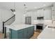 Beautiful kitchen featuring a center island, stainless steel appliances, and bright white cabinets at 216 E Harding St, Orlando, FL 32806