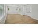 Spacious living room featuring hardwood floors and large windows at 216 E Harding St, Orlando, FL 32806