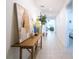 Inviting hallway featuring stylish decor and offering seamless transition into other living spaces at 573 Vista Villages Blvd, Davenport, FL 33896