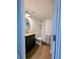 Bathroom featuring a granite-topped vanity, tile flooring, and a shower with a shower curtain at 85 Heather Point Ct # 850, New Smyrna Beach, FL 32169