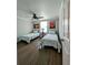 Charming bedroom featuring twin beds, a ceiling fan, and inviting decor at 85 Heather Point Ct # 850, New Smyrna Beach, FL 32169