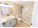Updated bathroom with a marble shower, modern vanity, and sleek fixtures at 1510 Avleigh Cir, Orlando, FL 32824