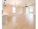 Open-concept living area with tile floors, ceiling fans and sliding glass doors at 1510 Avleigh Cir, Orlando, FL 32824