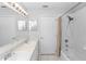 Bathroom with double sinks and a tub and shower with shower curtain at 433 Woodcrest St, Winter Springs, FL 32708