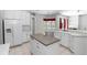 Kitchen with an island and stainless steel appliances, conveniently located near the breakfast nook at 433 Woodcrest St, Winter Springs, FL 32708