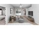 Cozy living room with neutral tones offers tranquil view of backyard pool area, creating a relaxing atmosphere at 433 Woodcrest St, Winter Springs, FL 32708