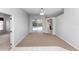 Spacious living room area features neutral paint and flooring, offering a blank canvas for personalization and decor at 433 Woodcrest St, Winter Springs, FL 32708
