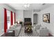 Bright living room with furniture, fireplace, and a doorway that leads to other parts of the house at 433 Woodcrest St, Winter Springs, FL 32708