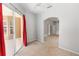 Empty space with sliding glass doors and an archway to another room providing access to the outdoors at 433 Woodcrest St, Winter Springs, FL 32708