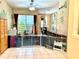 Bright playroom area with light-colored flooring, large windows, and playful wall décor for children at 433 Woodcrest St, Winter Springs, FL 32708