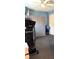 Room featuring vinyl flooring, a drop ceiling, a curtain, and a treadmill at 433 Woodcrest St, Winter Springs, FL 32708