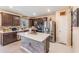 Modern kitchen with stainless steel appliances, granite countertops and mosaic backsplash at 5660 Keaton Springs Dr, Lakeland, FL 33811