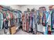Walk-in closet provides plenty of space for hanging and storing all clothing types at 5660 Keaton Springs Dr, Lakeland, FL 33811