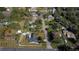 Aerial view of the property showcasing the backyard pool, and shed at 6143 Black Walnut Dr, Bartow, FL 33830