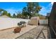 Fenced backyard with a brick patio, a storage shed, and mature trees at 6143 Black Walnut Dr, Bartow, FL 33830