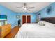 Comfortable primary bedroom with hardwood floors and access to the backyard at 6143 Black Walnut Dr, Bartow, FL 33830