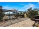 Outdoor patio with screened-in pool area with chairs for relaxing, and a shed at 6143 Black Walnut Dr, Bartow, FL 33830