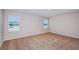Sunlit bedroom with neutral walls and carpet, offering a calming atmosphere at 742 Ambleside Dr, Haines City, FL 33844