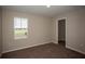 Cozy bedroom with plush carpeting and closet at 770 Ambleside Dr, Haines City, FL 33844