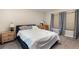 Comfortable bedroom with neutral tones, natural lighting, and stylish furnishings at 1368 Axel Cir, Winter Haven, FL 33880