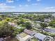 Aerial view of a single Gathering home nestled amongst trees and other homes at 229 Temple Ave, Fern Park, FL 32730