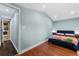 Inviting bedroom offers access to laundry room and bright natural light at 306 Avenue A E, Winter Haven, FL 33880