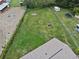 Expansive backyard featuring lush grass, a defined fence line, and potential for various outdoor activities at 4003 Prairie Bend Ln, Lakeland, FL 33812