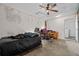 Bedroom offering natural light and an adjacent laundry area in a simple design at 4003 Prairie Bend Ln, Lakeland, FL 33812
