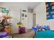 Bedroom with a fan, digital clock, and lots of furniture at 4003 Prairie Bend Ln, Lakeland, FL 33812
