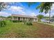 A charming home with well-maintained landscaping, showcasing its inviting curb appeal at 4003 Prairie Bend Ln, Lakeland, FL 33812