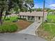 Charming single-story home with a well-manicured front yard and welcoming curb appeal at 4003 Prairie Bend Ln, Lakeland, FL 33812