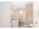 Bathroom featuring a double sink vanity with granite countertop at 647 San Pedro Dr, Lady Lake, FL 32159