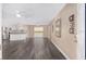 Spacious living area boasting modern flooring, neutral walls and ample natural light, offering a blank canvas at 647 San Pedro Dr, Lady Lake, FL 32159