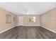 Bright, open living space featuring updated flooring and neutral decor for a cozy, inviting atmosphere at 647 San Pedro Dr, Lady Lake, FL 32159