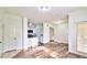Inviting living area with an open layout, complemented by modern wood-style flooring at 2572 Robert Trent Jones Dr # 1235, Orlando, FL 32835