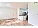 Open-concept living space with sleek, light-colored floors, seamlessly connecting to the kitchen area at 2572 Robert Trent Jones Dr # 1235, Orlando, FL 32835