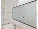 Clean bathroom with a large mirror, white vanity, toilet, and a shower/tub combo at 2586 Robert Trent Jones Dr # 1124, Orlando, FL 32835