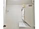 Compact laundry area with stacked washer and dryer, maximizing space efficiency at 2586 Robert Trent Jones Dr # 1124, Orlando, FL 32835