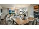 Bright living room with hardwood floors featuring modern furniture and decor with an open floorplan at 4023 Gardenia Ave, Lake Hamilton, FL 33851