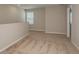 Bedroom featuring plush carpeting, a window with blinds, and neutral colored walls at 4106 Gerbera Daisy Ave, Lake Hamilton, FL 33851