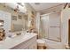 Bathroom with vanity sink, decorative nautical accents, and a shower with sliding glass doors at 4854 Myrtle View N Dr, Mulberry, FL 33860