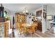 Dining room with wood flooring, traditional furniture, and easy access to the kitchen at 4854 Myrtle View N Dr, Mulberry, FL 33860
